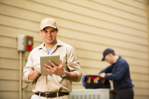 HVAC-technicians-working-on-system