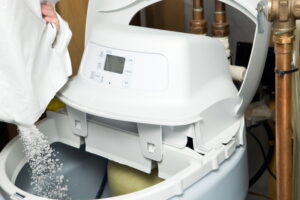 salt-being-poured-into-water-softener