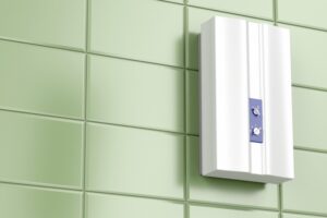 tankless-water-heater-on-green-tile-wall