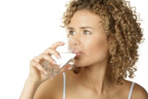 woman-drinking-glass-of-water